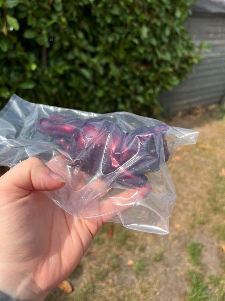 Sparkly ruby coloured comfy kit in the sunshine side view