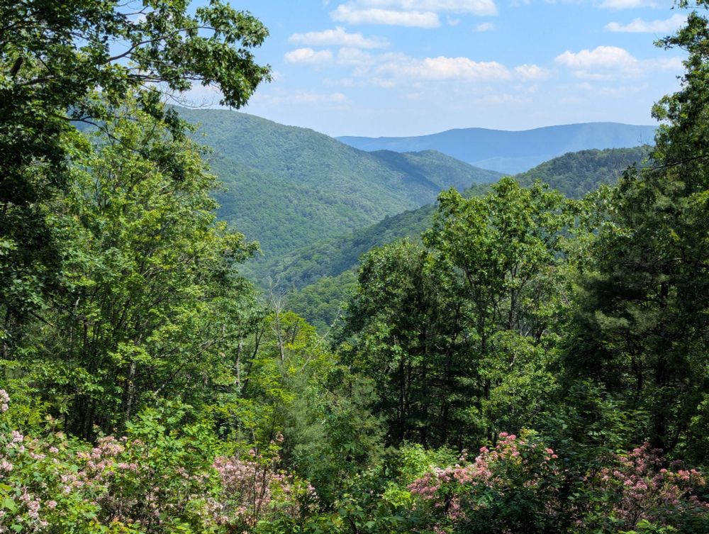 View of green mountains and blue sky 