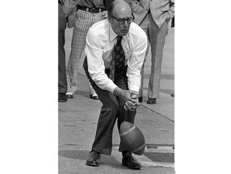 Robert Stanfield dropping a football