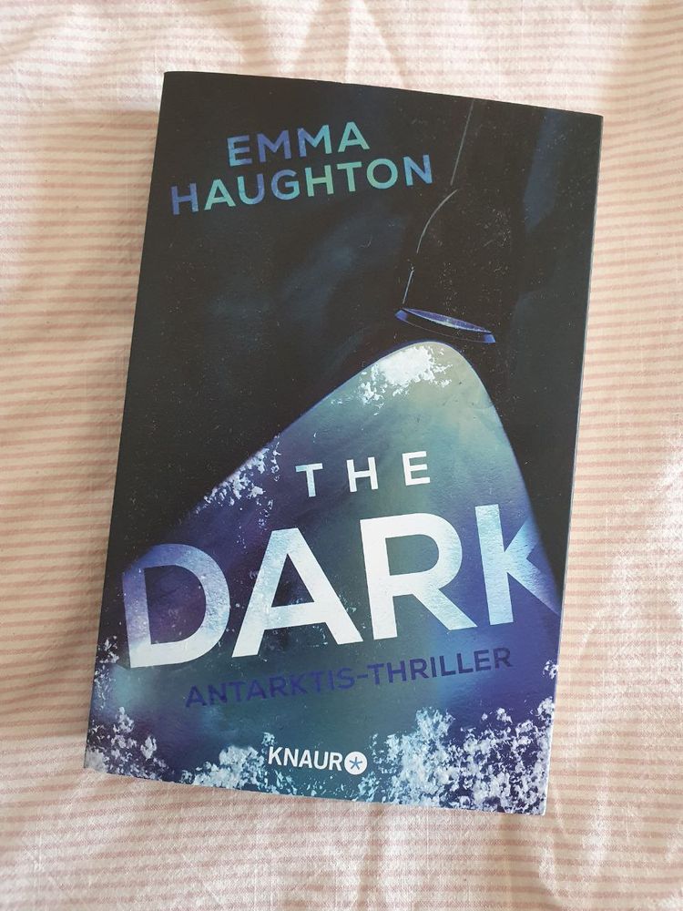 a german paperback edition of the dark