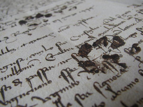 A cat pawprint left in the ink of a medieval manuscript.