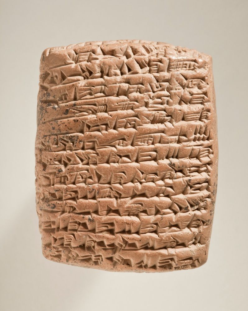 A cuneiform tablet with writing on it.