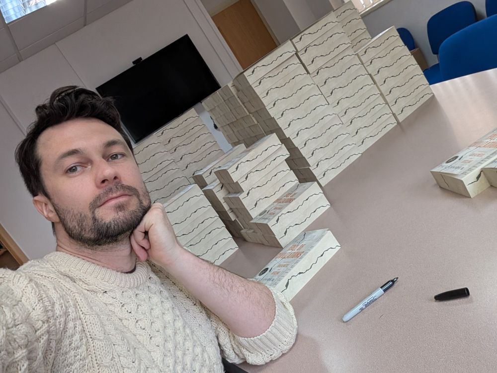 Me signing my upcoming paperback book: Fall of Civilizations - Stories of Greatness and Decline.