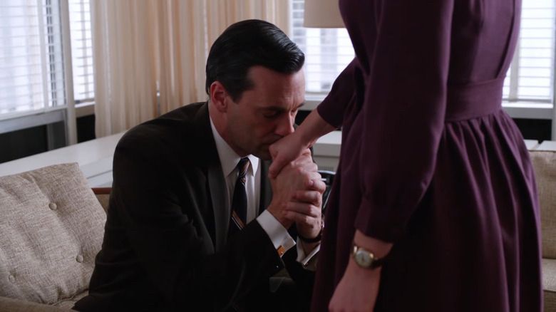 don draper kissing peggy olsen’s hand in season 5, episode 11 of mad men
