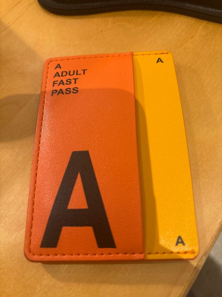 A leather card holder that looks like a Muni fast pass