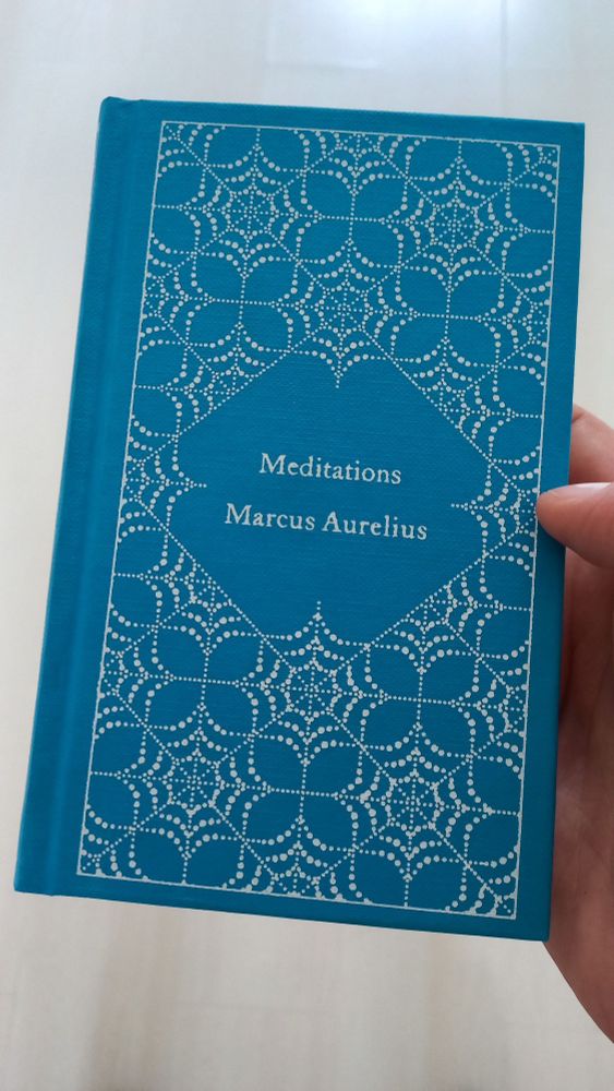 A picture of a beautiful blue hardcover copy of Marcus Aurelius' Meditations.