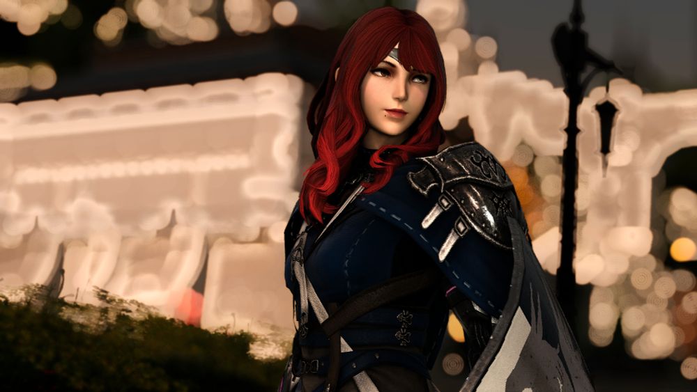 A red haired Midlander Hyur in a blue and silver armor.