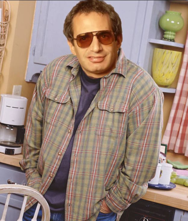 donald fagen’s smirking head superimposed on the sheepish kevin james stock image meme