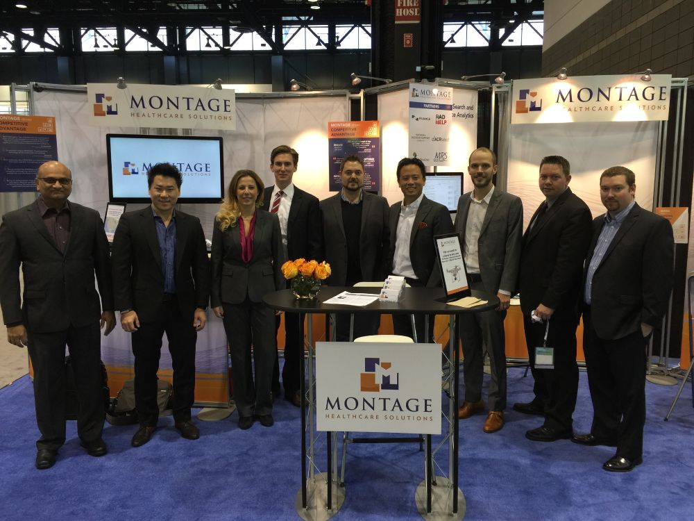 Woojin Kim, John Paulett, Jay Shah, Alla Grebelsky, and the rest of the Montage crew at the booth before the show opens