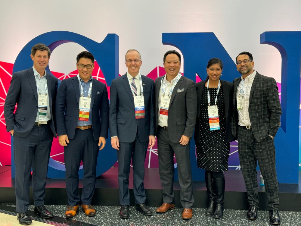 Picture of Penn Radiology alumni in front of the big RSNA sign