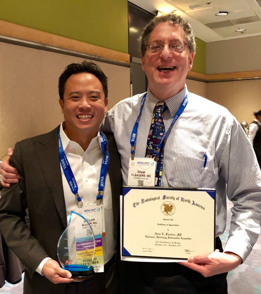 Adam Flanders and Bill receiving awards at the RSNA Informatics Committee meeting