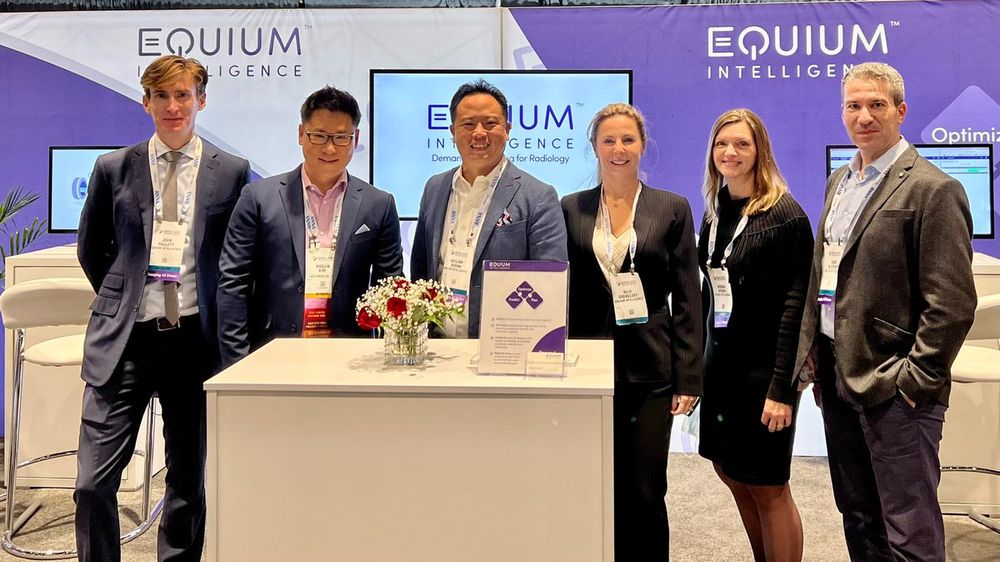 John Adziovsky, John Paulett, Woojin Kim, Alla Grebelsky at the Equium Booth