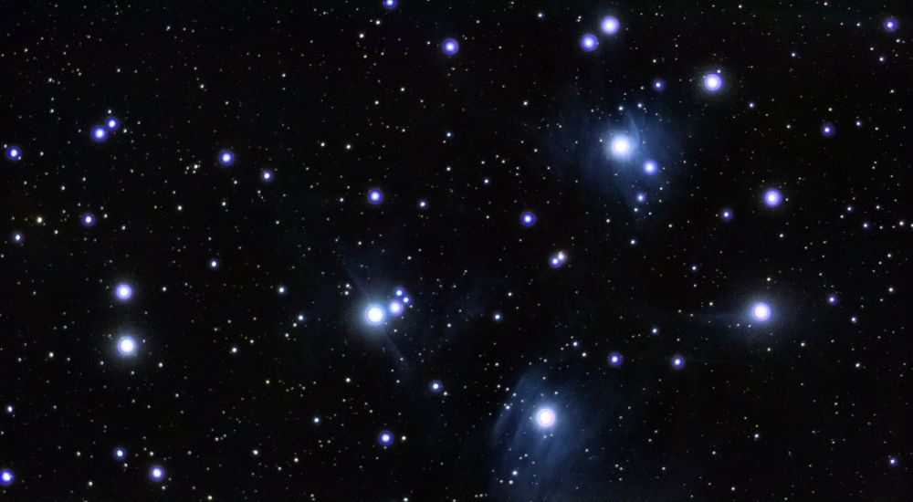 M45 (Pleiades/Seven Sisters) - the nebula around the stars is starting to come out. I'll keep adding to it. My new camera makes adding to images much, much easier!