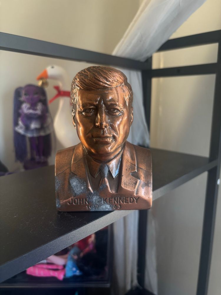 JFK is a bronze piggy bank