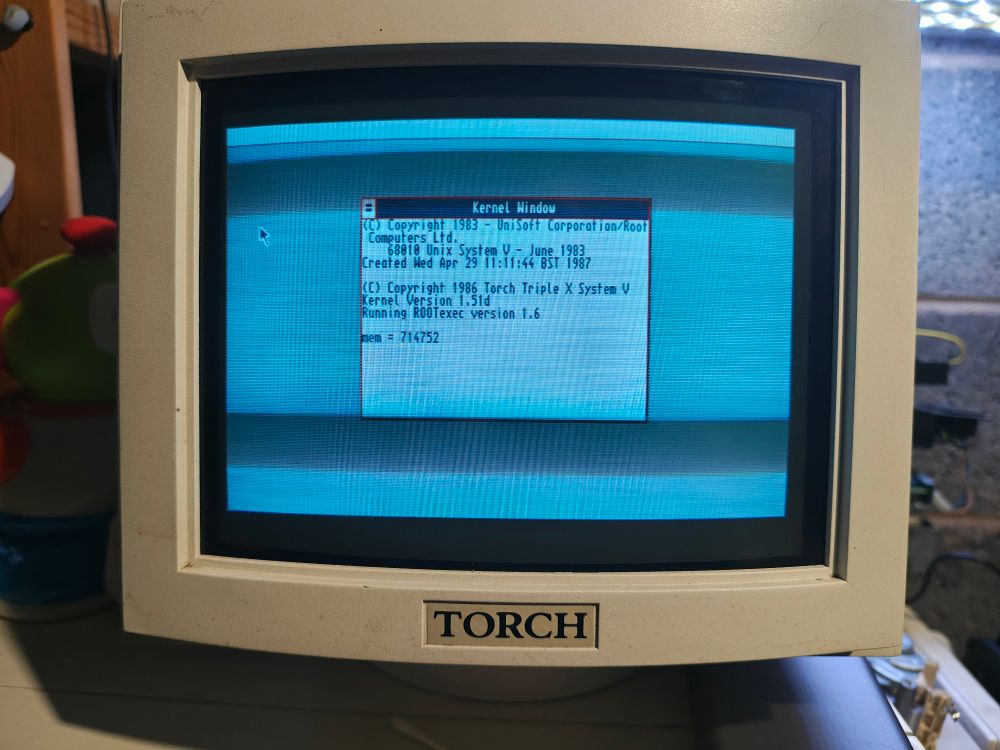 A picture of the Torch Triple X screen booting from the limpet test disk. The boot has stopped at the message "mem = 714752".