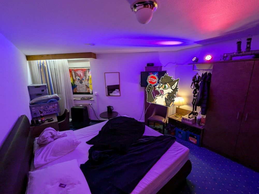 Hotel room with colorful lights. 
