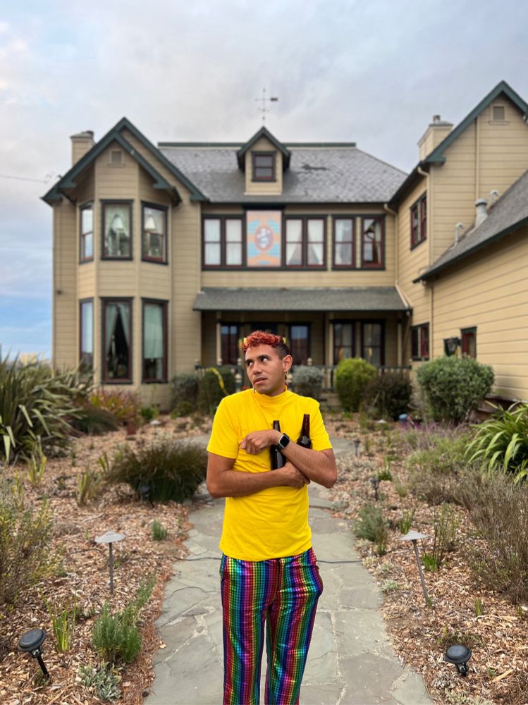 Dressed as Tatum Riley holding beers in front of the Spring Hill Estate, aka “Stu Macher’s House”