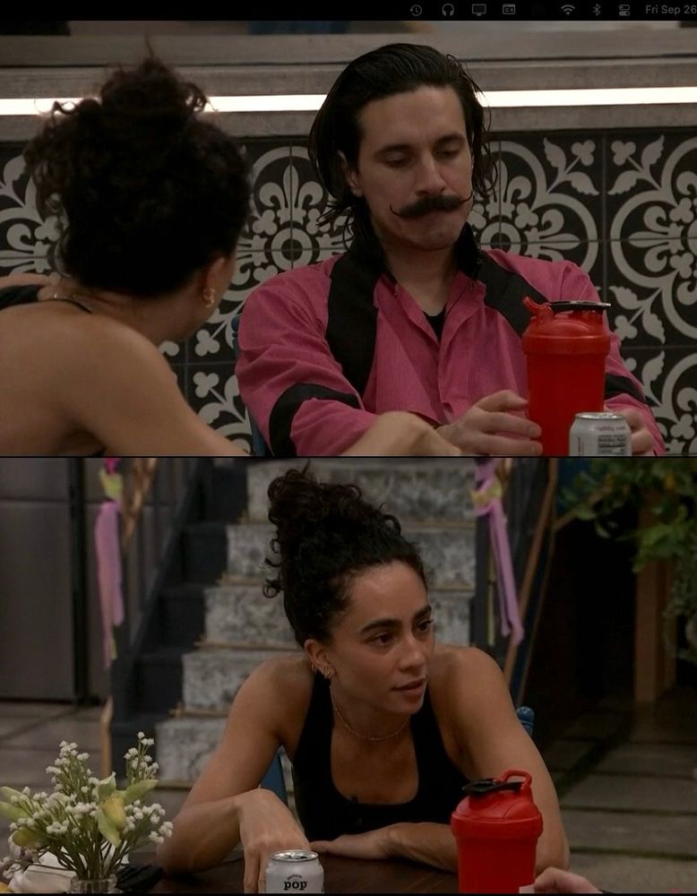 Morgan trying to talk life into a very depressed Vince while sitting at the tiny dining room table