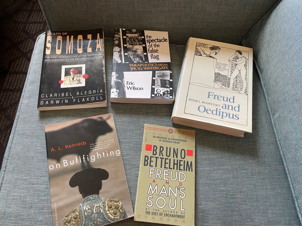 A picture of five books: DEATH OF SOMOZA: THE FIRST PERSON ACCOUNT OF THE GUERRILLAS WHO ASSASSINATED THE NICARAGUAN DICTATOR, THE SPECTACLE OF THE FALSE FLAG: PARAPOLITICS FROM JFK TO WATERGATE, FREUD AND OEDIPUS, FREUD AND MAN’S SOUL, ON BULLFIGHTING 