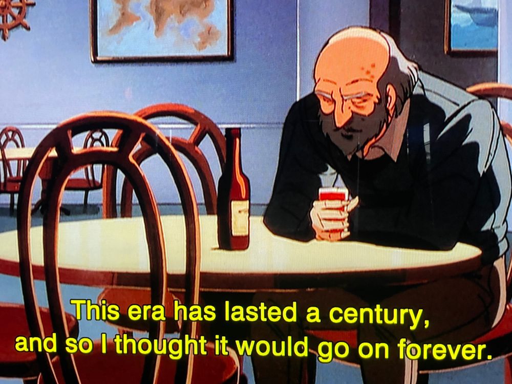 A sad old man hunched over his drink in a bar. The subtitle reads “This era has lasted a century, and so I thought it would go on forever.”
