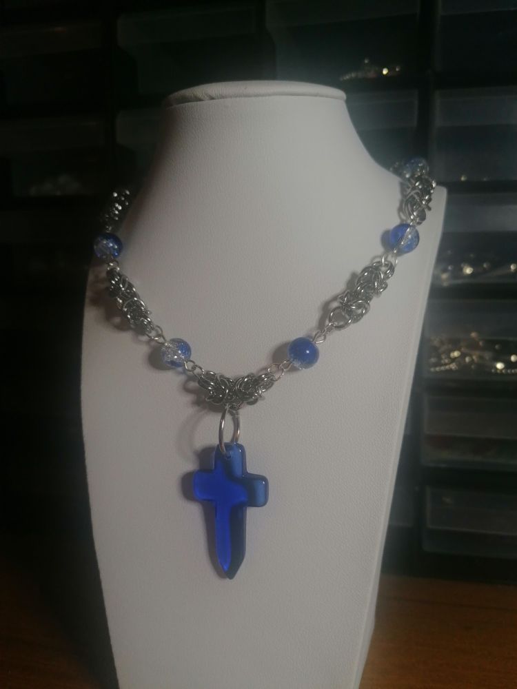 Byzantine sections with blue glass crackle beads & a blue glass cross pendant. 