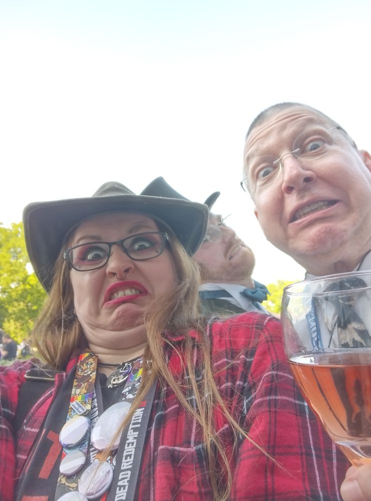 Photo of a Genderfluid AFAB person pulling a disgusted face. Taken 2023.