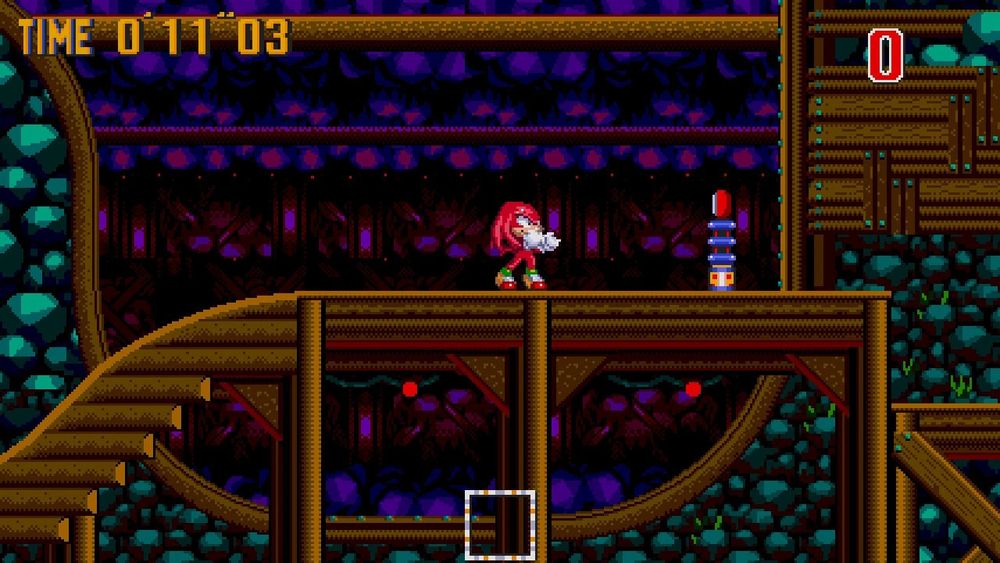 A screenshot from "Sonic the Hedgehog 3" of Knuckles standing in a giant cave level known as "Endless Mine." 