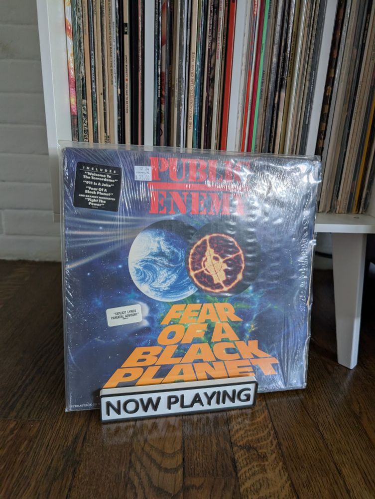 A picture of a vinyl record of Public enemy's fear of a black planet