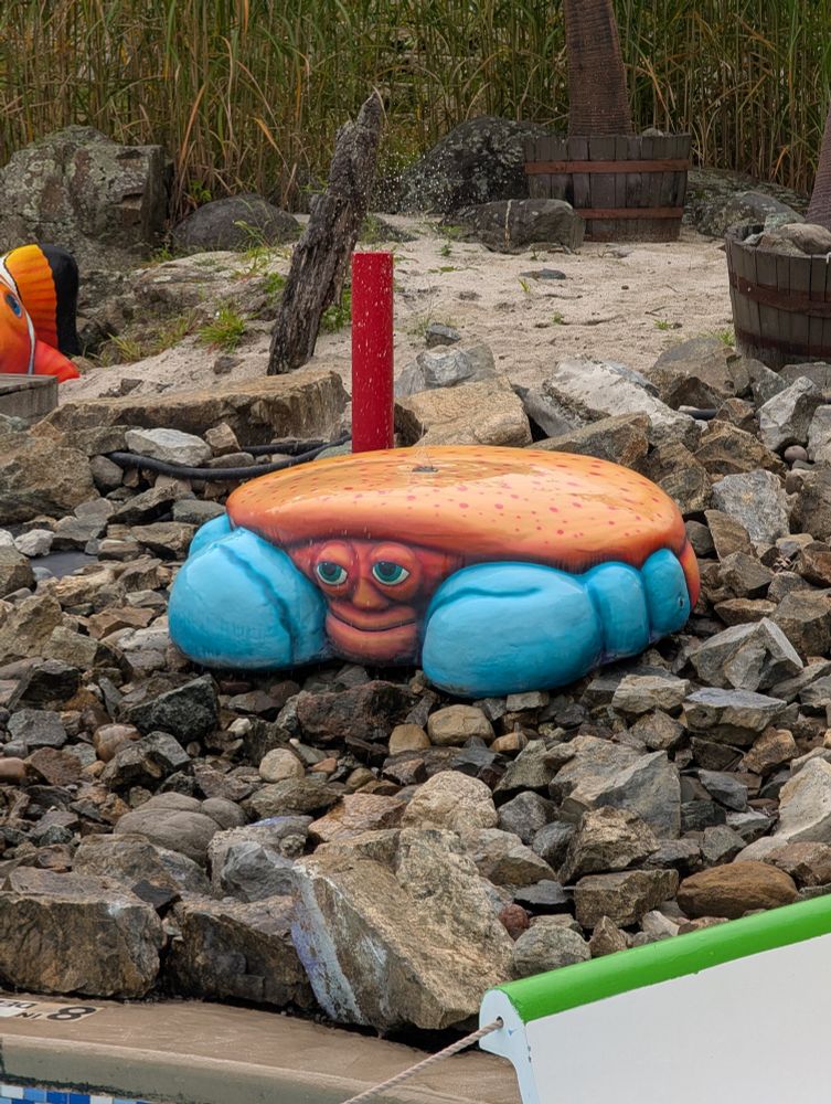 A goddamn terrifying crab with a human face.
