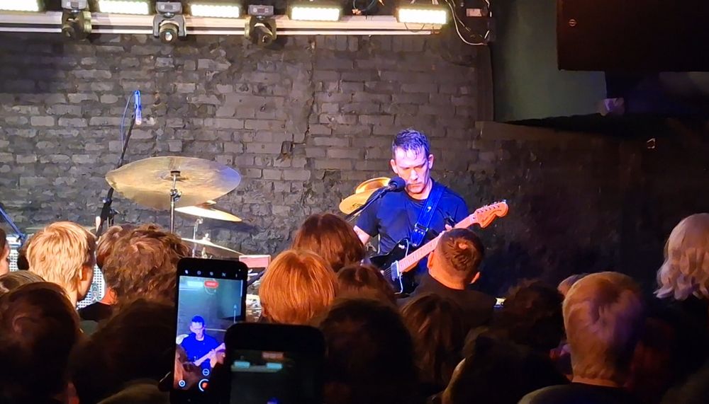 A picture pre-edit of Jamie Stewart playing at Hydrozagadka