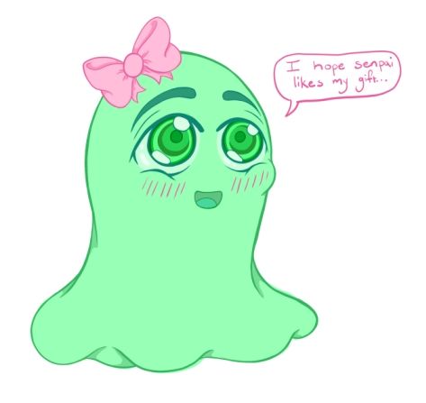 A green blob creature with cute "anime" eyes, smiling and blushing. They have a pink bow on top of their head, and there is a word balloon saying "I hope senpai likes my gift..."