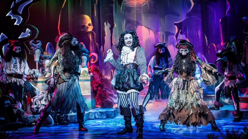 Jazz Evans as Captain Hook surrounded by skeleton zombies.