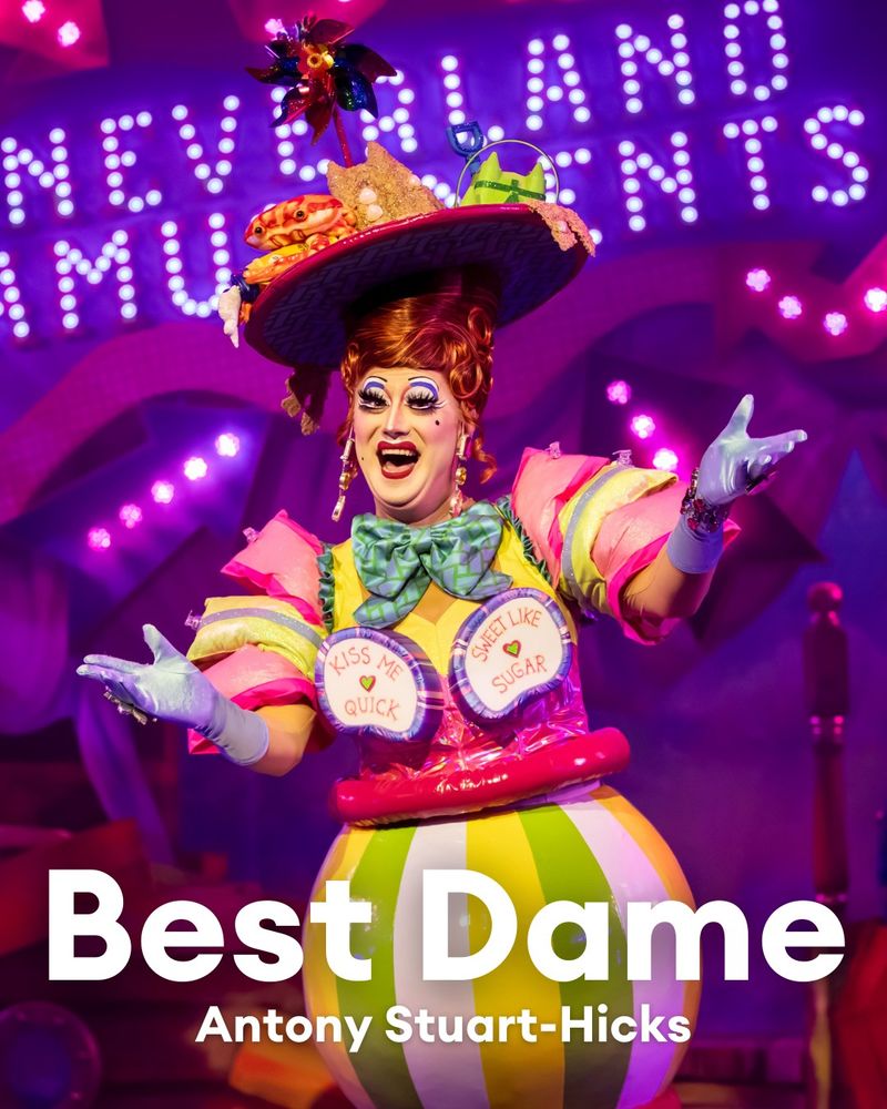 An image of Antony Stuart-Hicks dressed as Sherry Smee in a seaside themed costume and the text "Best Dame Antony Stuart-Hicks"