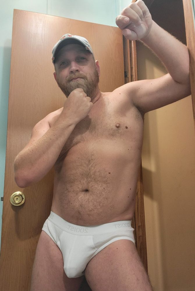 Mannin tightywhities and a cap