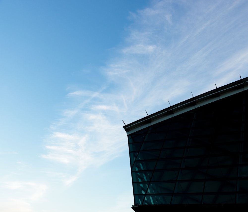 Blue sky cut into by Glasgow Science Centre