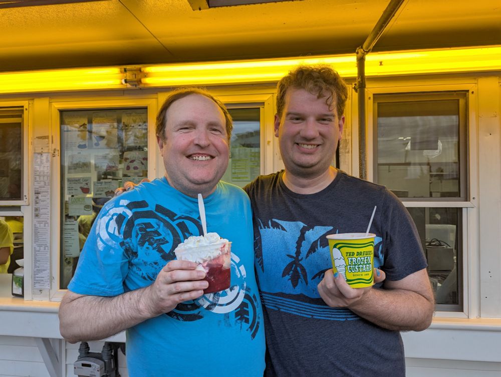 Ryan holding a frozen custard strawberry shortcake and me holding a concrete, both from Ted Drewes