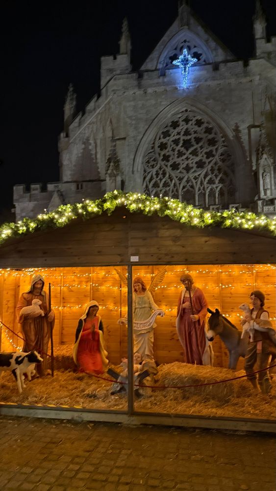 The nativity scene at Exeter Christmas market with the cathedral in the background 