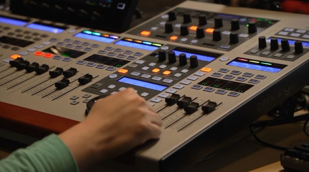 My hand on the digital mixer running audio tech in the finale video