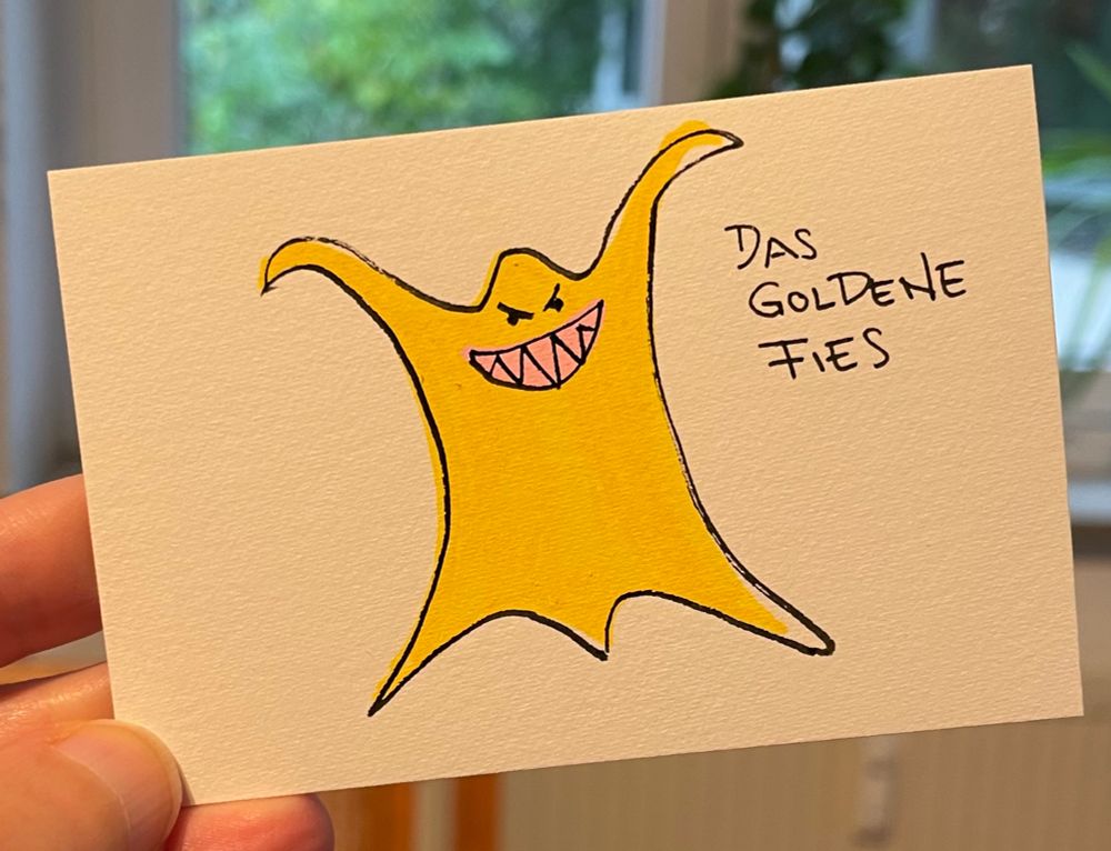 Zeichnung: ein goldenes Flies mit einem fiesen Grinsen im Gesicht.
Text: das goldene Fies 
