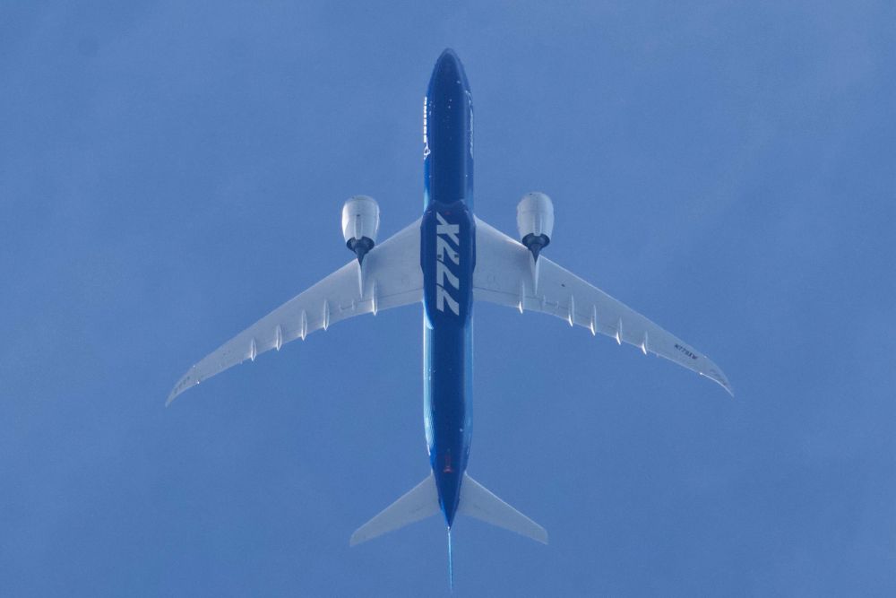Boeing 777X WH001 (registration N779XW) in flight over Edmonds, Washington, on Nov. 11, 2025. 