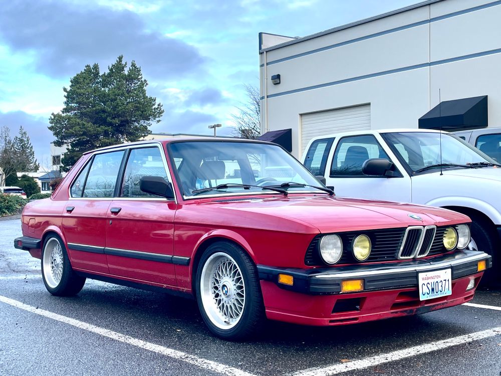 A red 1988 E28 BMW 535is 
