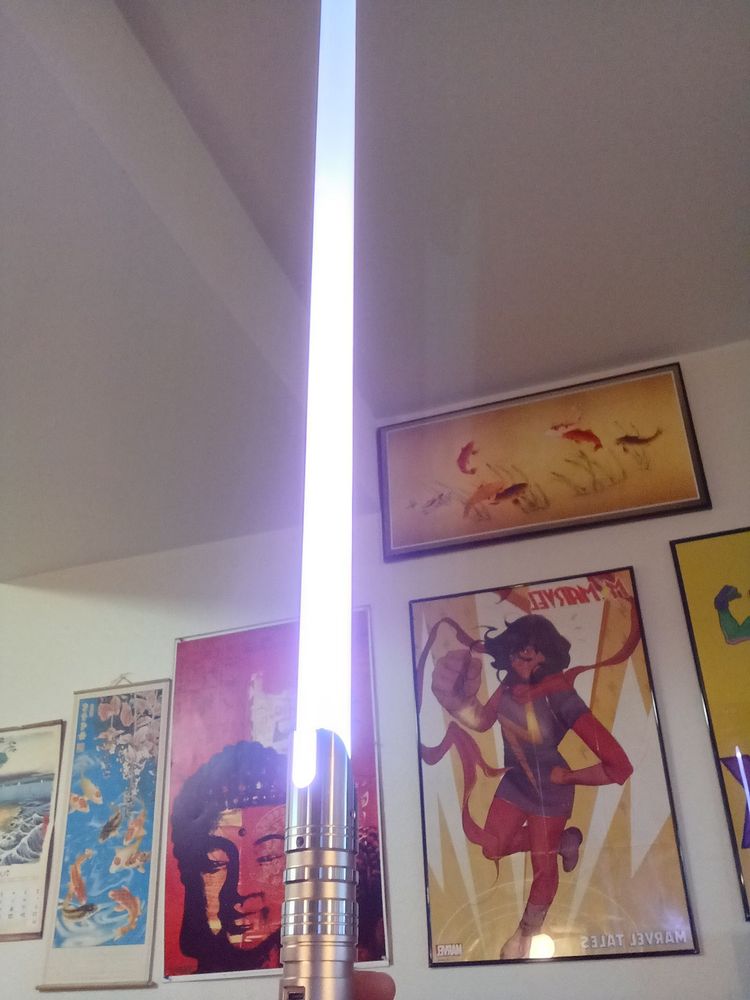 "Golden Hammer" by Artsabers (lightsaber with a white blade)