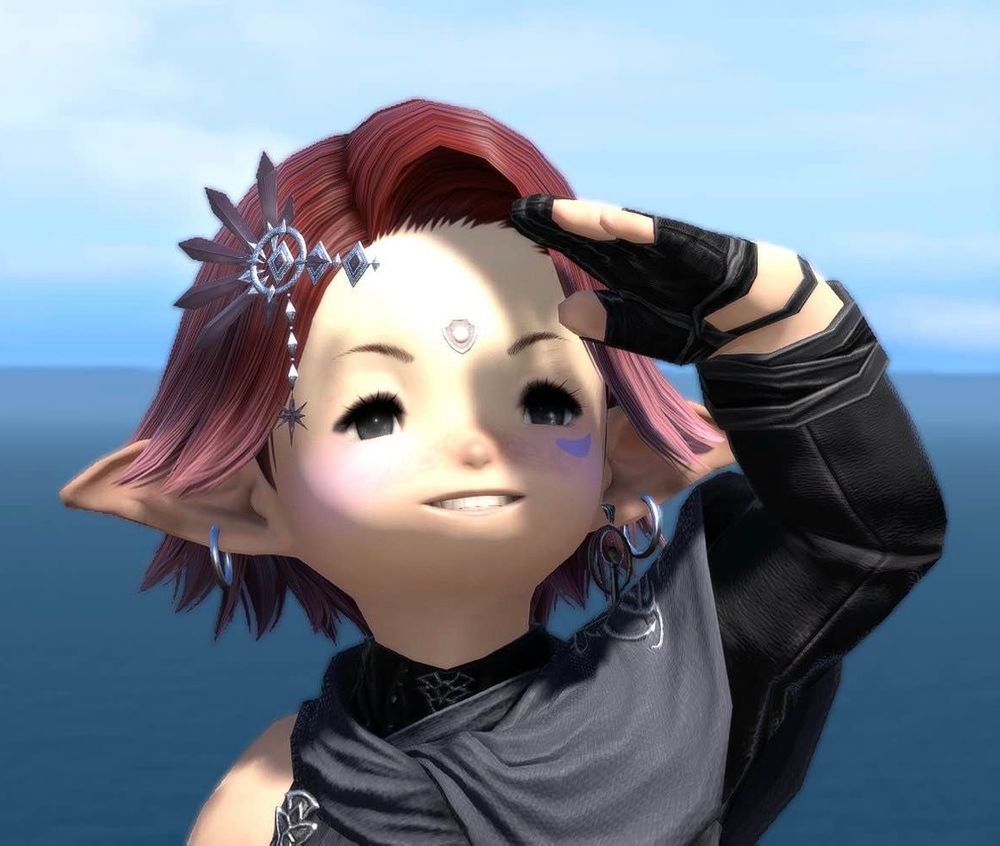 Lunowli smiling as they look out off the bow of a ship 