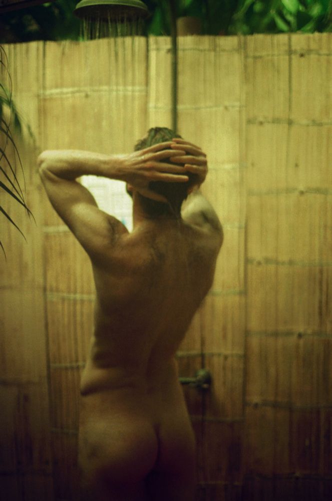 Man in outdoor shower