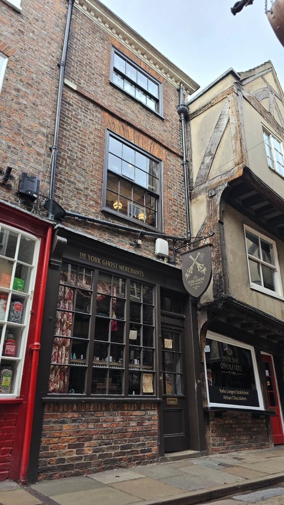 The Tudor looking storefront.