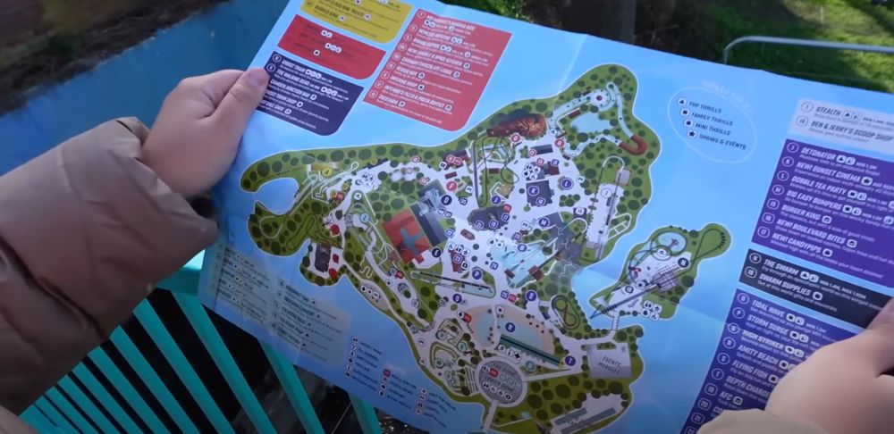 Hands hold open the 2024 Thorpe Park map