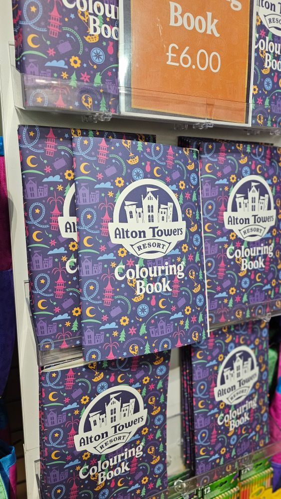 A colouring book with the repeating resort pattern.