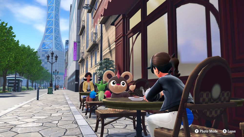 My character with Litleo in a café, Prism Tower in the distance