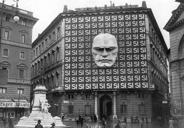 Mussolini face on wall