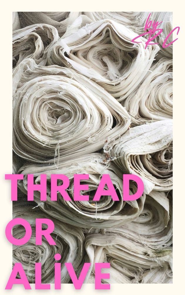Book cover for Thread or Alive by RC. Has pink text over the ends of spools of white cotton fabric. 